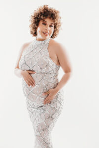 Pregnant mother in jeweled maternity gown in editorial maternity session in Phoenix