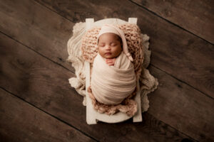 Infant posed for baby pictures at phoenix photography studio