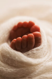 Baby toes in Phoenix baby portraits at a newborn studio 