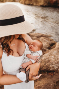 Baby and mom for sunset family session