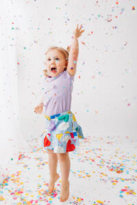 child playing during mini session in Phoenix studio 