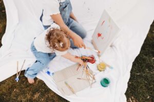 Detail shot of kids painting during phoenix photography session