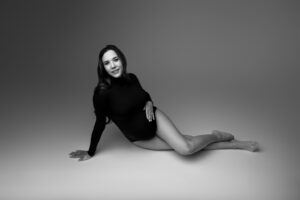 Pregnant mom in body suit during phoenix maternity session 