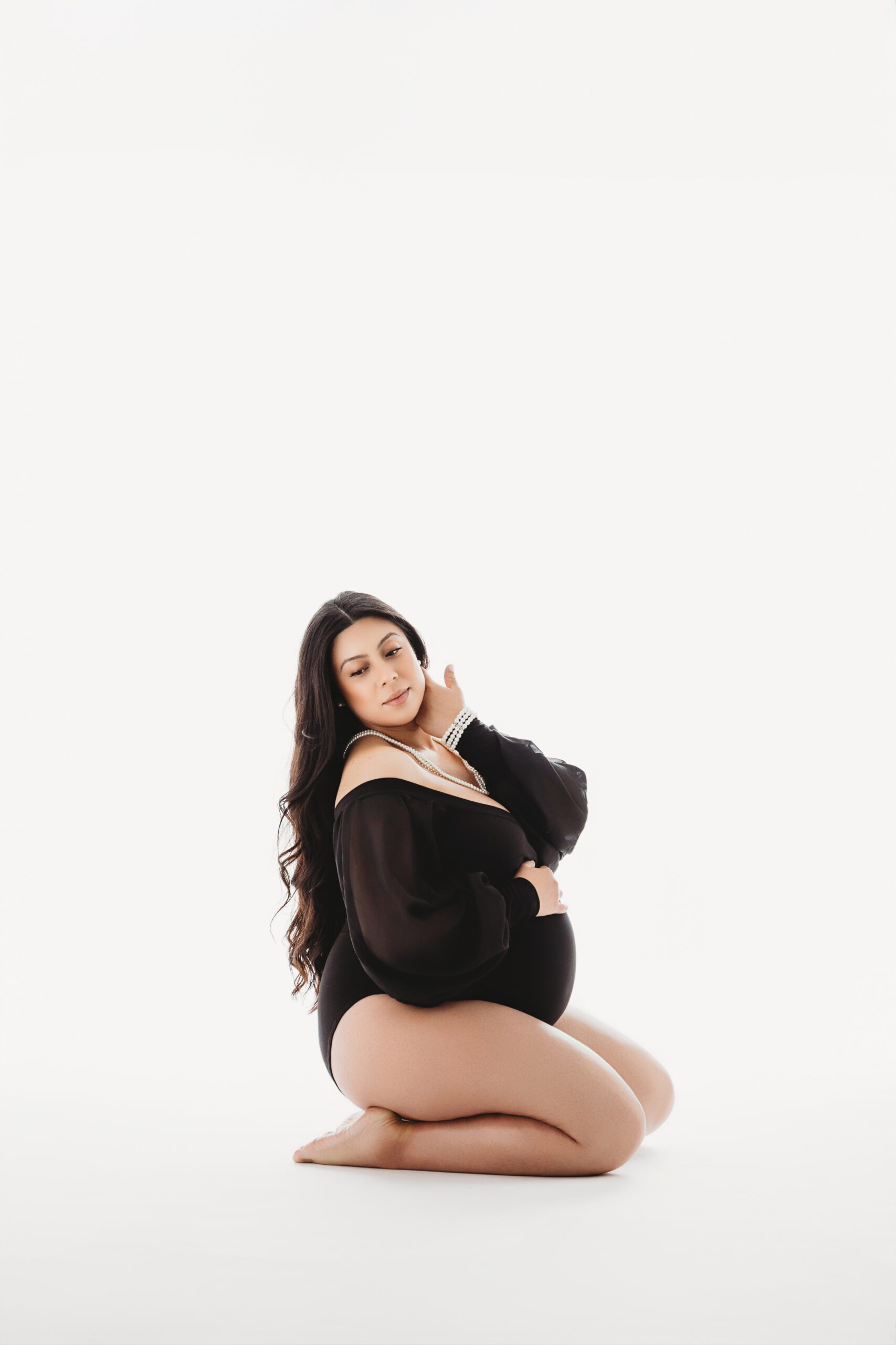 Mom in body suit for scottsdale maternity session