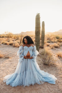Destination maternity session at Superstition Mountains black mom in a blue dress 