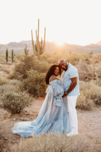 Destination maternity session at Superstition Mountains black mom in a blue dress 