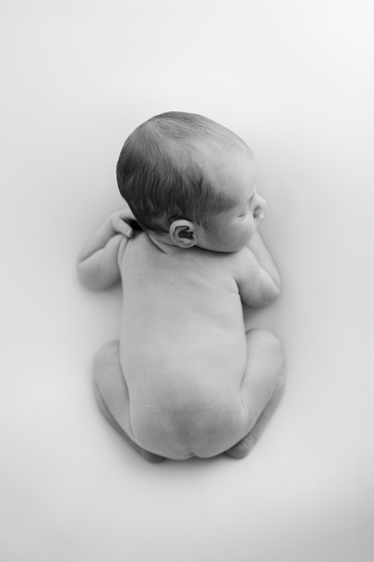 Why Baby-Led Posing Matters in Newborn Photography in Phoenix