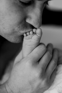 Experience timeless Phoenix lifestyle newborn photography in-studio. Natural, emotive images in a cozy setting—no need to use your home.