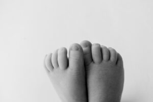 Experience timeless Phoenix lifestyle newborn photography in-studio. Natural, emotive images in a cozy setting—no need to use your home.