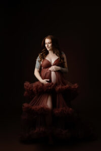 mom posing for studio maternity pictures in Arizona for maternity portraits